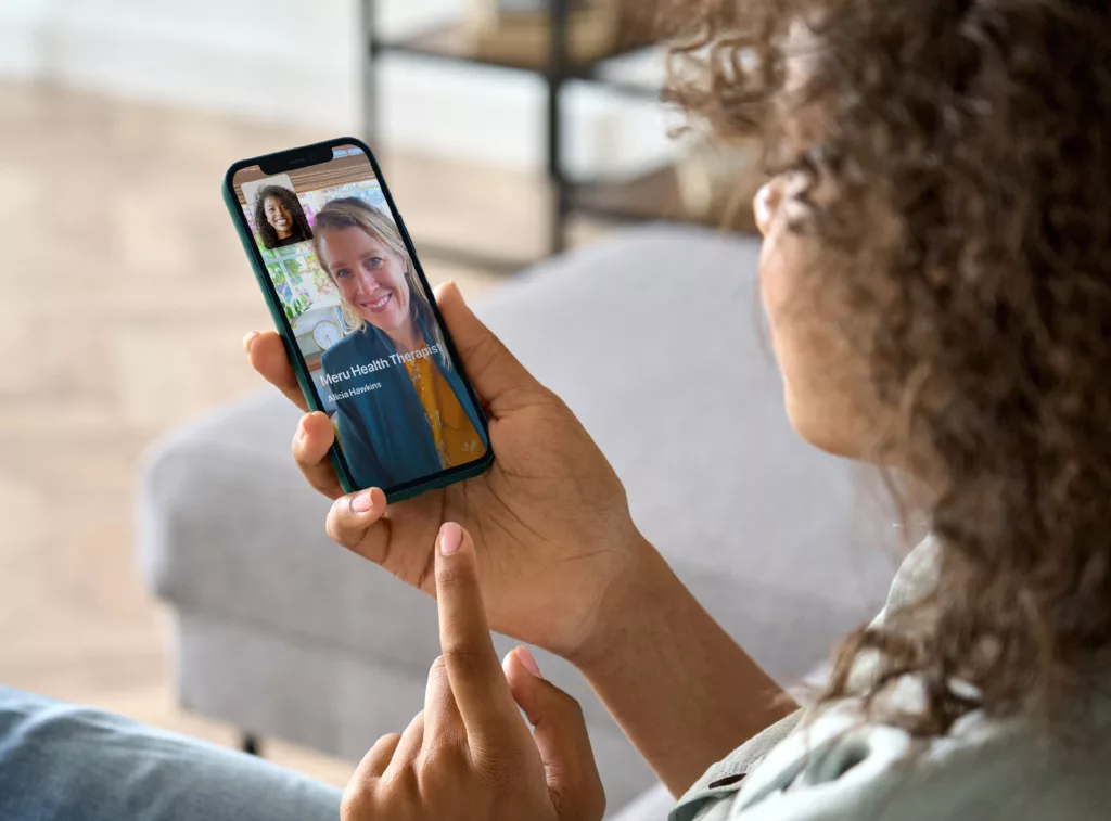 Woman interacting on device Meru appa