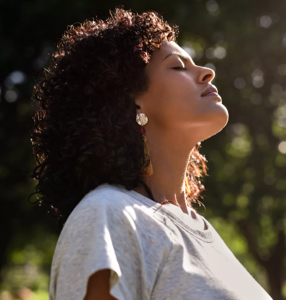 Woman smiling in sunshine